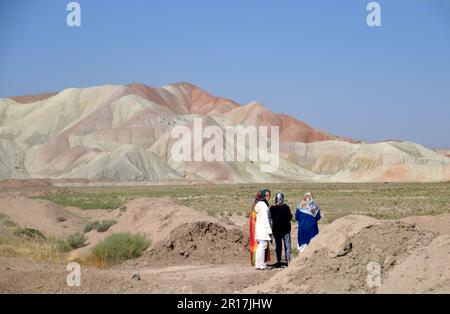 Iran:  remarkable scenery in the Kandovan area of Azarbaijan Province between Zanjan and Tabriz.  The hills are coloured by their mineral content. Stock Photo