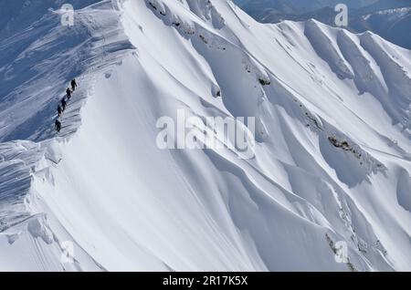 Climbers walking the ridgeline of Mt. Daisen Stock Photo - Alamy
