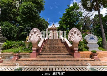 Wat Phnom is a Buddhist temple located in Phnom Penh, Cambodia. It is the tallest religious structure in the city. Stock Photo
