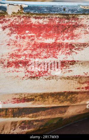 A detail of fading paintwork on a boat, Teignmouth, Devon, Great Britain. Stock Photo