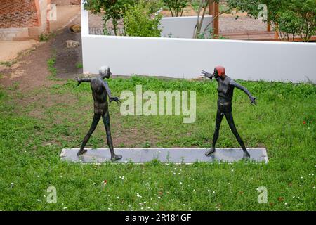 July 2021, Erfurt Germany, Two men, a new sculpture in Erfurt Stock Photo