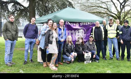 Manchester, UK, 12th May, 2023. Members of the train drivers’ union Aslef on strike held a picket at Victoria Railway Station, Manchester, UK. Aslef is the Associated Society of Locomotive Engineers and Firemen. Further strikes are planned 31st May and 3rd June and  RMT members will strike on the 13th May. Credit: Terry Waller/Alamy Live News Stock Photo