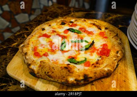 the making of Margherita pizza Stock Photo