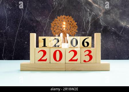 June 12 calendar date text on wooden blocks with blurred nature background. Copy space and calendar concept. Stock Photo