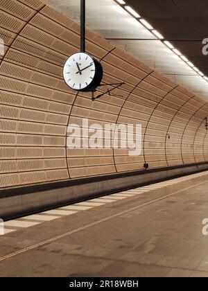 An antique clock in a train station in Scandinavian Stock Photo
