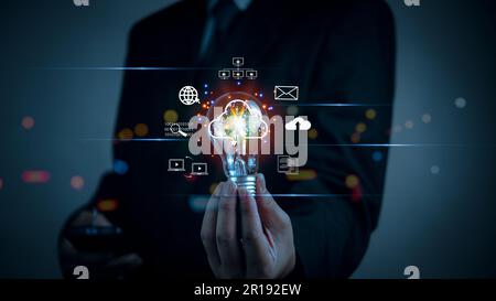 Hand holding Light bulb global Internet connection. Innovation cloud computing digital technology marketing, information management, big data. Stock Photo