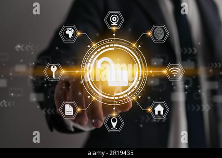 Businessman Hand and Finger Touching Screen and Hexagon HUD Unlock Security Sign. Security Technology System or Firewall and Protection Concept Stock Photo