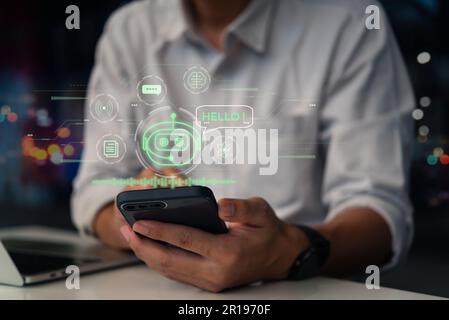ChatGPT Chat with AI or Artificial Intelligence. Digital chatbot, robot application, OpenAI generate. Futuristic technology, Man using smartphone and Stock Photo