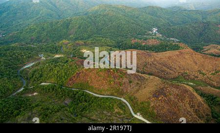 aerial view on the peak in sunset the village far from civilization Traveling on a difficult road. Beautiful sunset view on the hilltop complex. The s Stock Photo