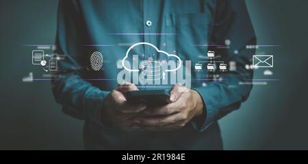 Cloud computing technology security measures to protect customer data organizations and individuals store, process, and access data.Hand using smartph Stock Photo