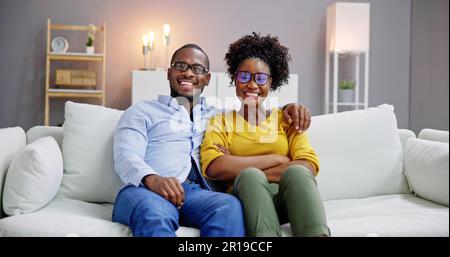 Portrait Of An Happy African Young Couple With Eyeglasses Stock Photo