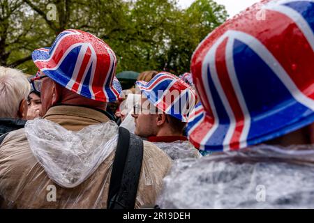 British People Standing In The Mall After The Coronation of King Charles III, London, UK. Stock Photo