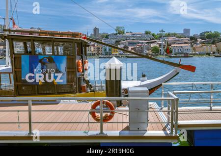 Porto, Portugal - April 17, 2023: A traditional boat for river cruises waiting for tourists Stock Photo