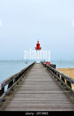 The Trouville-sur-Mer lighthouse against a blue sky in France Stock Photo