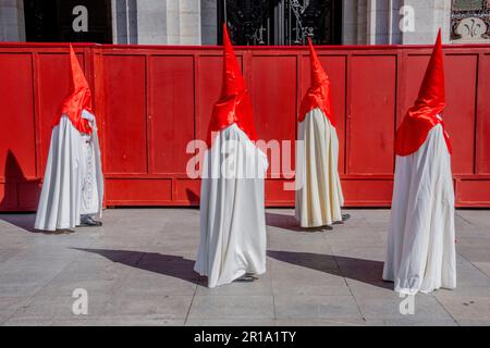 Members of the Cofradía de las Siete Palabras during a Semana Santa procession in Valladolid, Spain Stock Photo