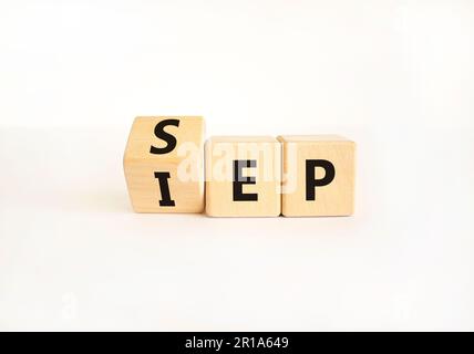 SEP or IEP symbol. Concept words IEP initial enrollment period SEP special enrollment period. Beautiful white table white background. Medical initial Stock Photo
