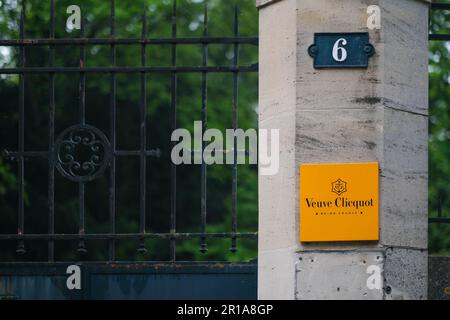 A sign and logo for Veuve Clicquot, the Champagne house owned by Louis Vuitton and part of the LVMH group, on a gate in their base in Reims. Stock Photo