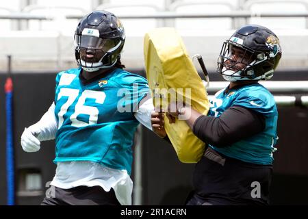 Jacksonville Jaguars guard Cooper Hodges (75) goes against Jacksonville  Jaguars guard Samuel Jackson, right, in a drill during the NFL football  team's rookie camp, Saturday, May 13, 2023, in Jacksonville, Fla. (AP