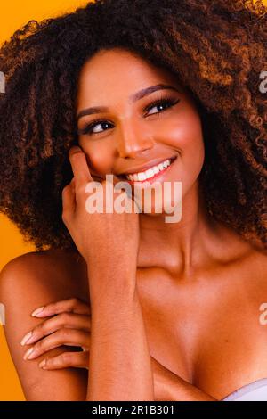 African American skincare models with perfect skin and curly hair. Beauty spa treatment concept. Stock Photo