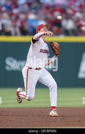 First Base. 12th May, 2023. Razorback third baseman Caleb Cali #6 makes a throw across the infield to first base. Arkansas defeated South Carolina 4-1 in Fayetteville, AR, Richey Miller/CSM/Alamy Live News Stock Photo