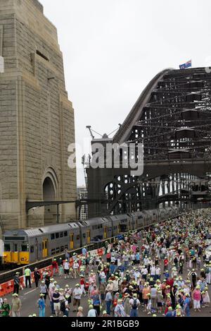 Australians celebrating the 75th Anniversary of Sydney Harbour Bridge with a walk across the Bridge. Sydney, Australia. 18.03.2007. Stock Photo