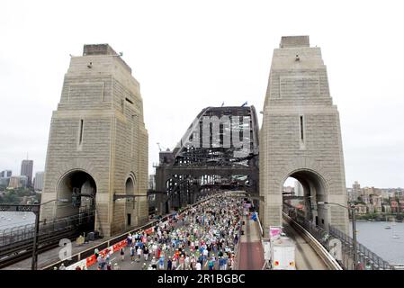 Australians celebrating the 75th Anniversary of Sydney Harbour Bridge with a walk across the Bridge. Sydney, Australia. 18.03.2007. Stock Photo