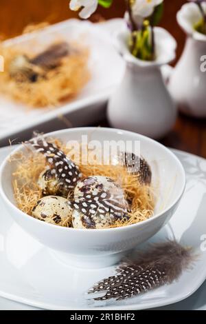 Easter place setting with quail eggs Stock Photo