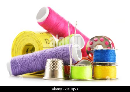 Composition with tailor needles and threads over white background Stock  Photo - Alamy