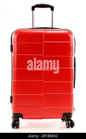 Large red travel suitcase isolated on white background Stock Photo