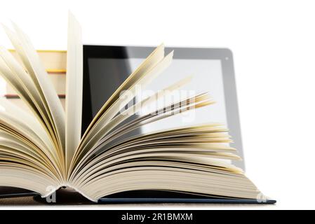 Composition with books and tablet computer isolated on white background Stock Photo