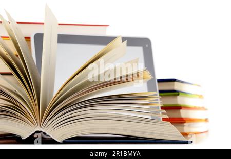 Composition with books and tablet computer isolated on white background Stock Photo