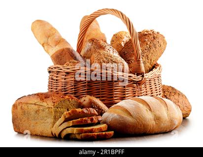Wicker basket with assorted baking products isolated on white background Stock Photo