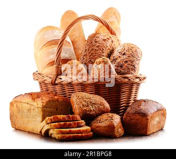 Wicker basket with assorted baking products isolated on white background Stock Photo