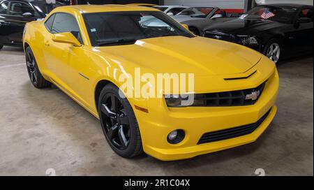 Bordeaux , Aquitaine  France - 05 09 2023 : Chevrolet camaro logo text and brand sign on yellow muscle car american Stock Photo