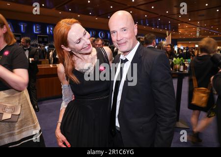 Berlin, Germany. 12th May, 2023. Andrea Sawatzki and Christian Berkel arrive at the German Film Awards Aftershow Party. The 'Lola' is Germany's most highly endowed cultural award. Credit: Gerald Matzka/dpa/Alamy Live News Stock Photo