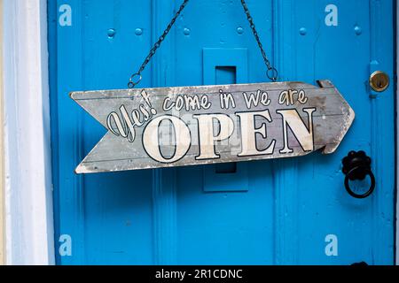 Open sign on blue door to Bell's Tea Rooms, Steep Hill Lincoln old town Lincoln city 2023 Stock Photo