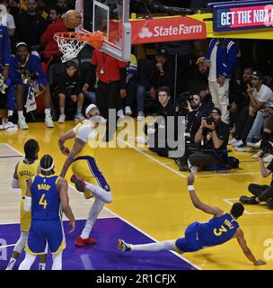 Los Angeles, United States. 12th May, 2023. Golden State Warriors guard Jordan Poole is fouled by Los Angeles Lakers forward Anthony Davis as he during the second half of Game 6 of the Western Conference semifinals at Crypto.com Arena in Los Angeles on Friday, May 12, 2023. The Lakers open the Western Conference finals at Denver on Tuesday. Photo by Jim Ruymen/UPI Credit: UPI/Alamy Live News Stock Photo