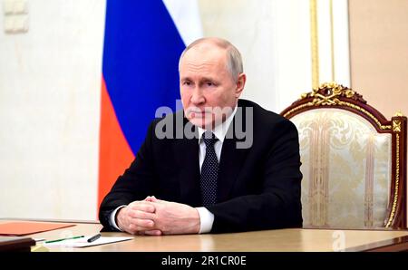 Moscow, Russia. 12th May, 2023. Russian President Vladimir Putin hosts a remote video conference with the permanent members of the Security Council from the Kremlin, May 12, 2023 in Moscow, Russia. The meeting coincided with reports of Russian forces being pushed back from positions in Bakhmut. Credit: Mikhail Klimentyev/Kremlin Pool/Alamy Live News Stock Photo