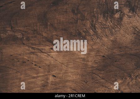 Old grunge background made of dark textured wood, surface made of old brown wood texture. A template for your design with space to copy. High quality photo Stock Photo