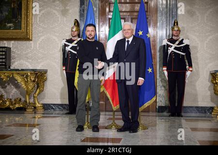 Rome, Italy. 13th May, 2023. Italian President Sergio Mattarella, right, welcomes Ukrainian President Volodymyr Zelenskyy, left, during the arrival ceremony at the Quirinal Palace, May 13, 2023 in Rome, Italy. Credit: Pool Photo/Ukrainian Presidential Press Office/Alamy Live News Stock Photo