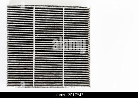 Car air filter. Through use, there are stains and dirt. Bad smell inside the car. Changing and cleaning the car air filter to purify air and prevent d Stock Photo