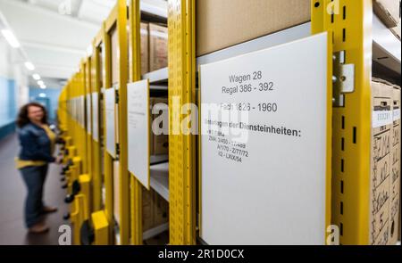 13 May 2023, Saxony, Chemnitz: An Archivist Opens The Rolling Shelving ...