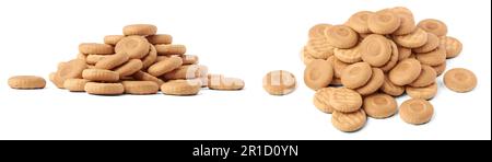 pile of milk biscuits or cookies, crispy and crunchy round shape sweet crackers, tea time snack or dessert isolated on white background Stock Photo