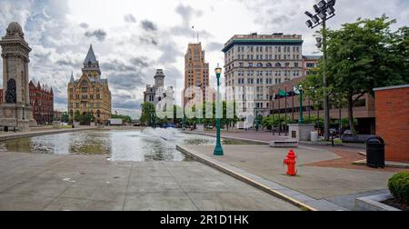 Clinton Square, looking east: The view is dominated by historic bank buildings; reflecting pool and fountain are in Erie Canal’s former path. Stock Photo