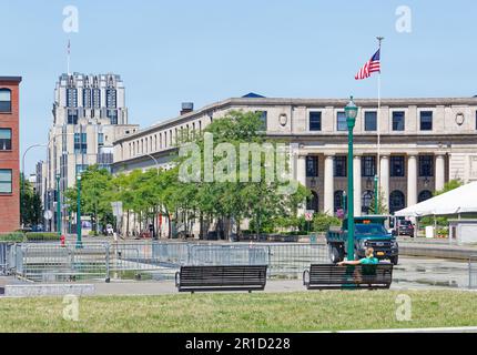 Clinton Exchange, built in 1928 as a post office and federal building, became commercial offices in 1985. Niagara Mohawk Building rises in background. Stock Photo