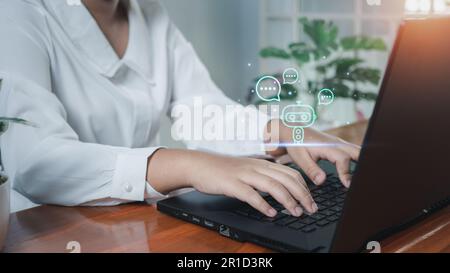 Business woman are working and bringing AI to help them work on computers. Chat with Ai. Chat bot . Stock Photo