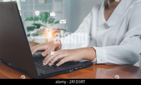 Human hand working on computer and cloud icon. Cloud computing concept, connect communication equipment  information and technology with cloud computi Stock Photo