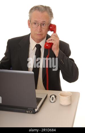 Senior businessman with a rather interesting expression Stock Photo
