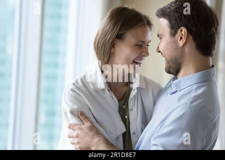 Joyful happy young couple in love enjoying close relationship Stock Photo