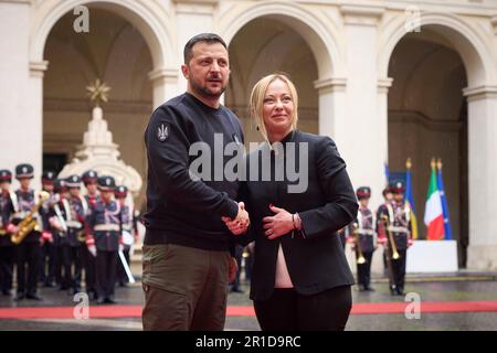 Rome, Italy. 13th May, 2023. Italian Prime Minister Giorgia Meloni, right, welcomes Ukrainian President Volodymyr Zelenskyy, left, during the arrival ceremony at the Palazzo Chigi, May 13, 2023 in Rome, Italy. Credit: Pool Photo/Ukrainian Presidential Press Office/Alamy Live News Stock Photo